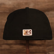 The MiLB logo on the back side of the gray bottom fitted Philly's cheesesteak without onions fitted cap.