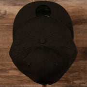 The top view of the crown of the Philly Cheesesteak with onions New Era fitted cap.