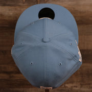 The top view of the crown of the ice blue Philadelphia Phillies 1996 All Star Game retro side patch New Era fitted cap.