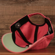 The inside of the Dodgers green bottom dad hat.