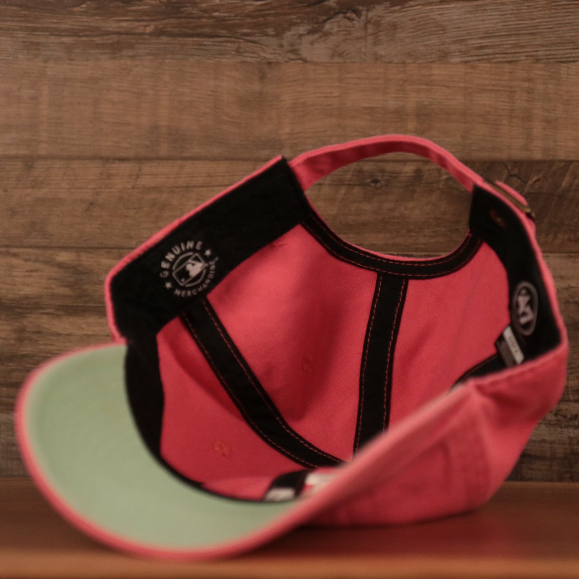 The inside of the Dodgers green bottom dad hat.