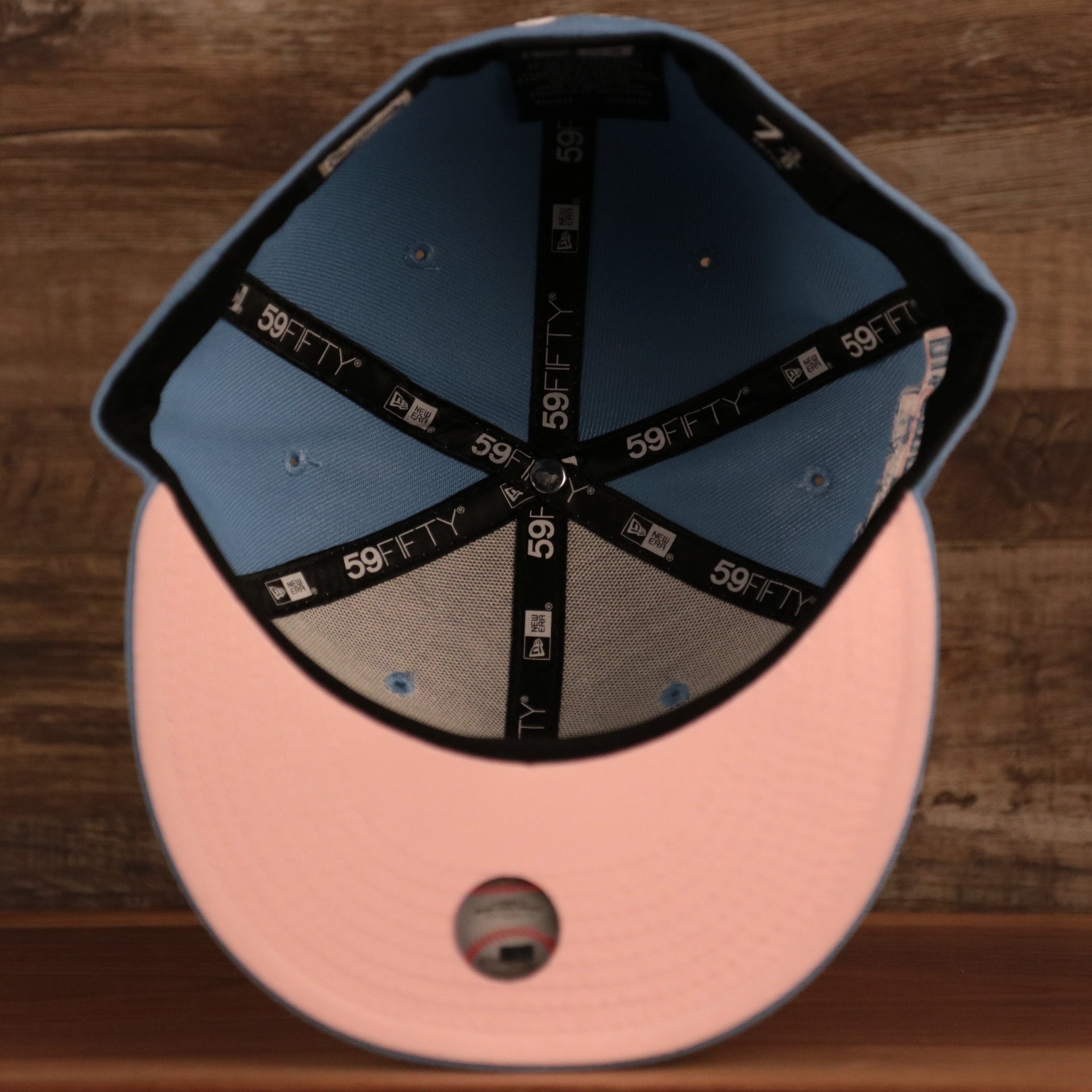 An inside look of the Philadelphia Phillies MLB 1996 All Star Game pink bottom fitted 59fifty.