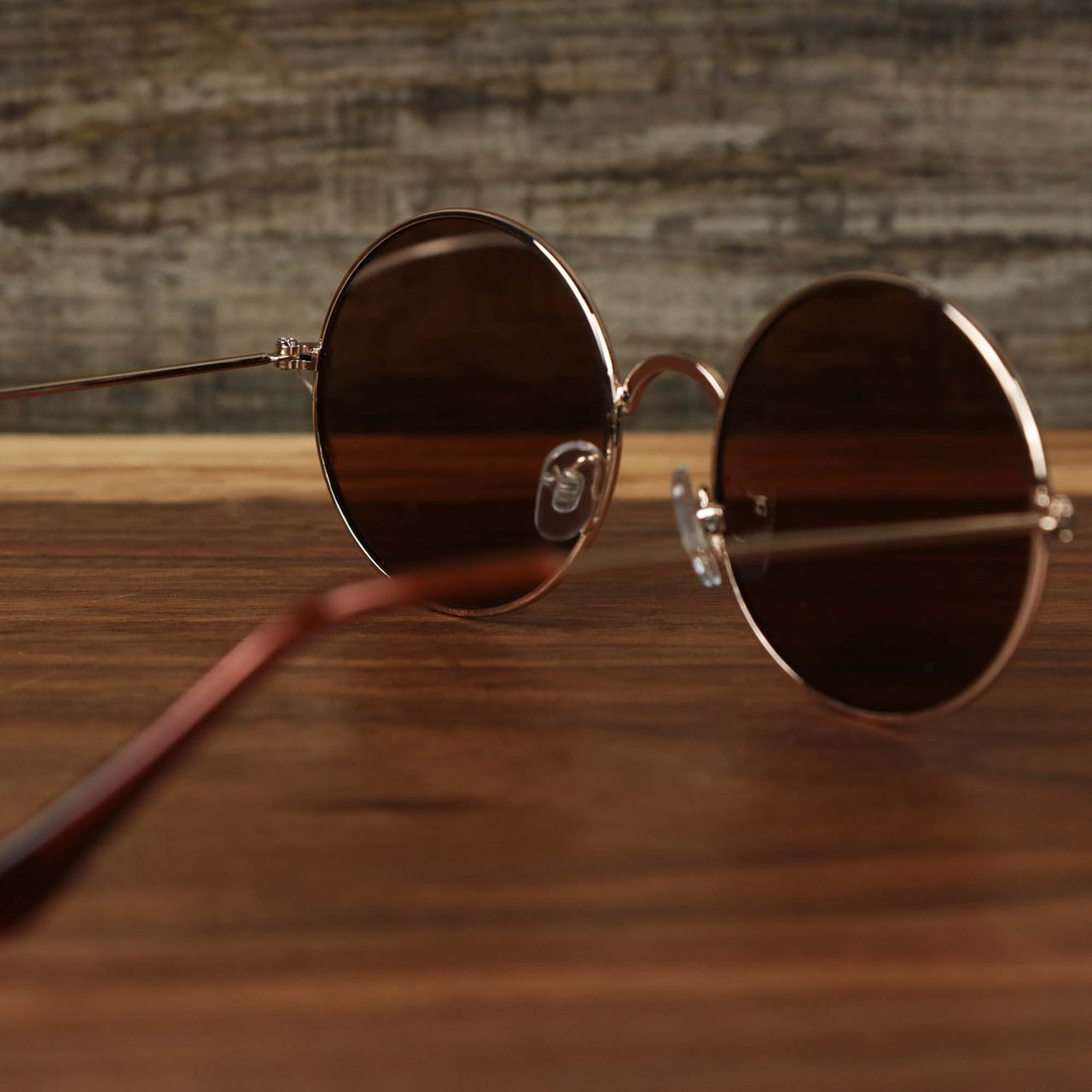 The inside of the Youth Round Frame Pink Lens Sunglasses with Rose Gold Frame