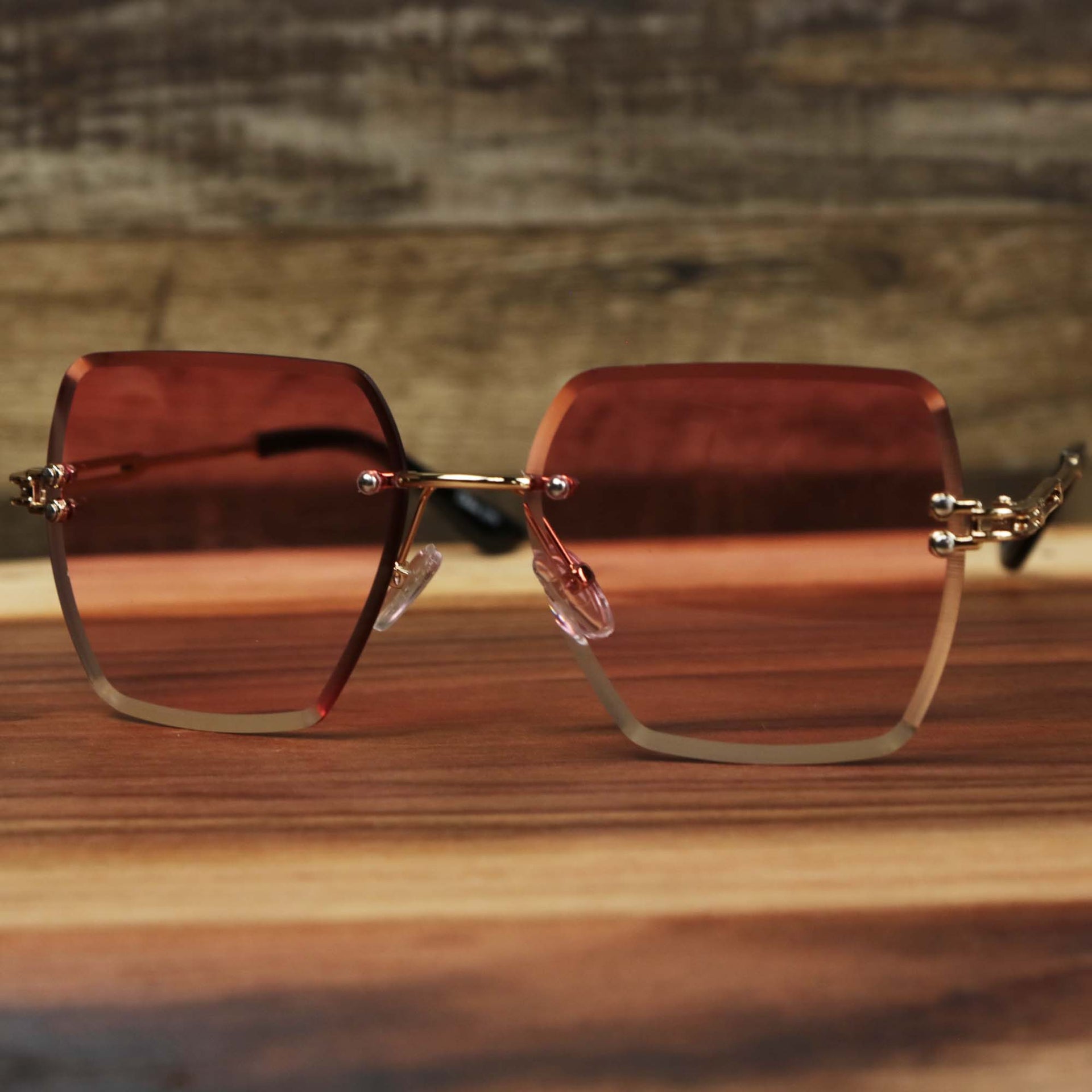 The Large Lightweight Frame Pink Lens Sunglasses with Rose Gold Frame