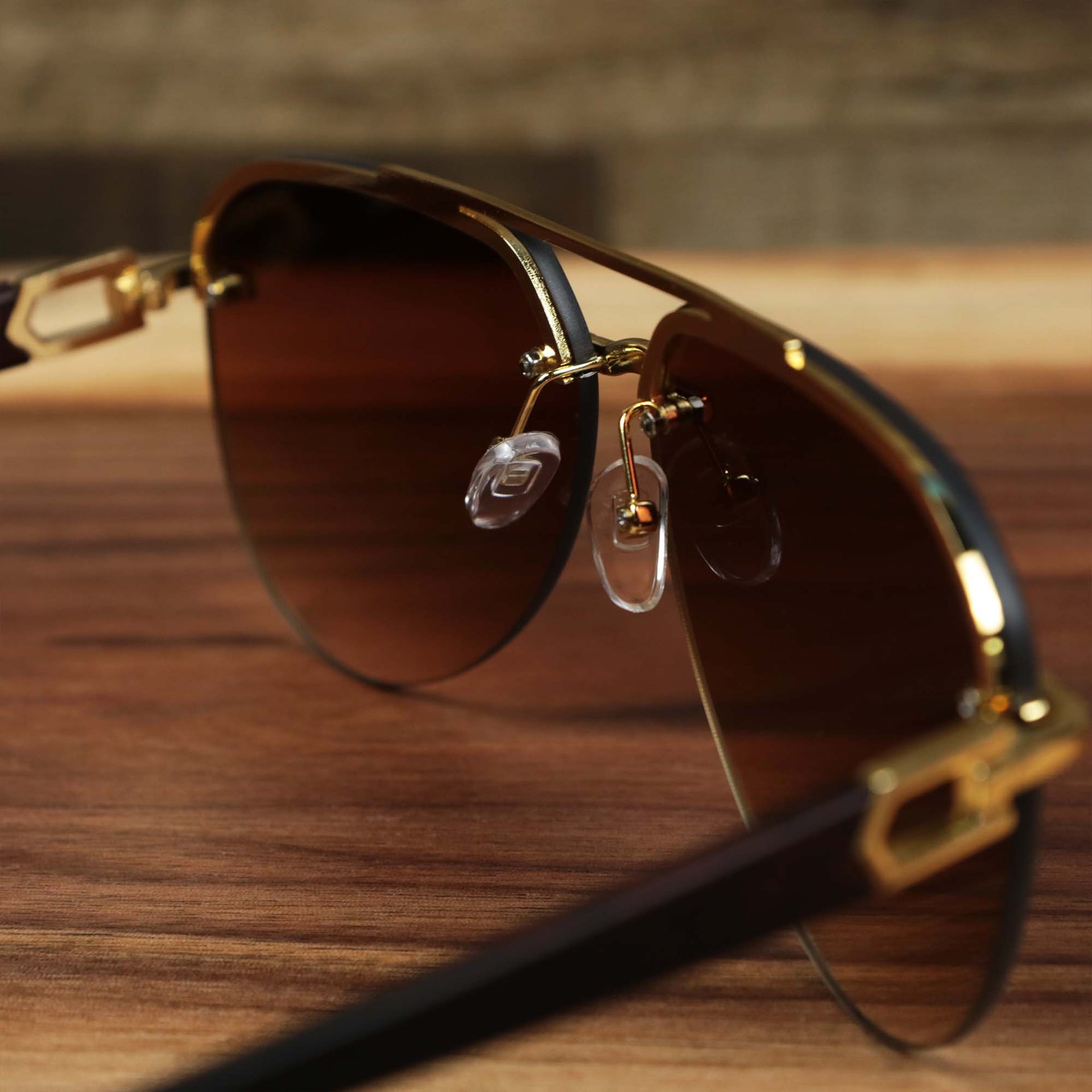 The inside of the Round Aviator Frames Brown Gradient Lens Sunglasses with Gold Frame