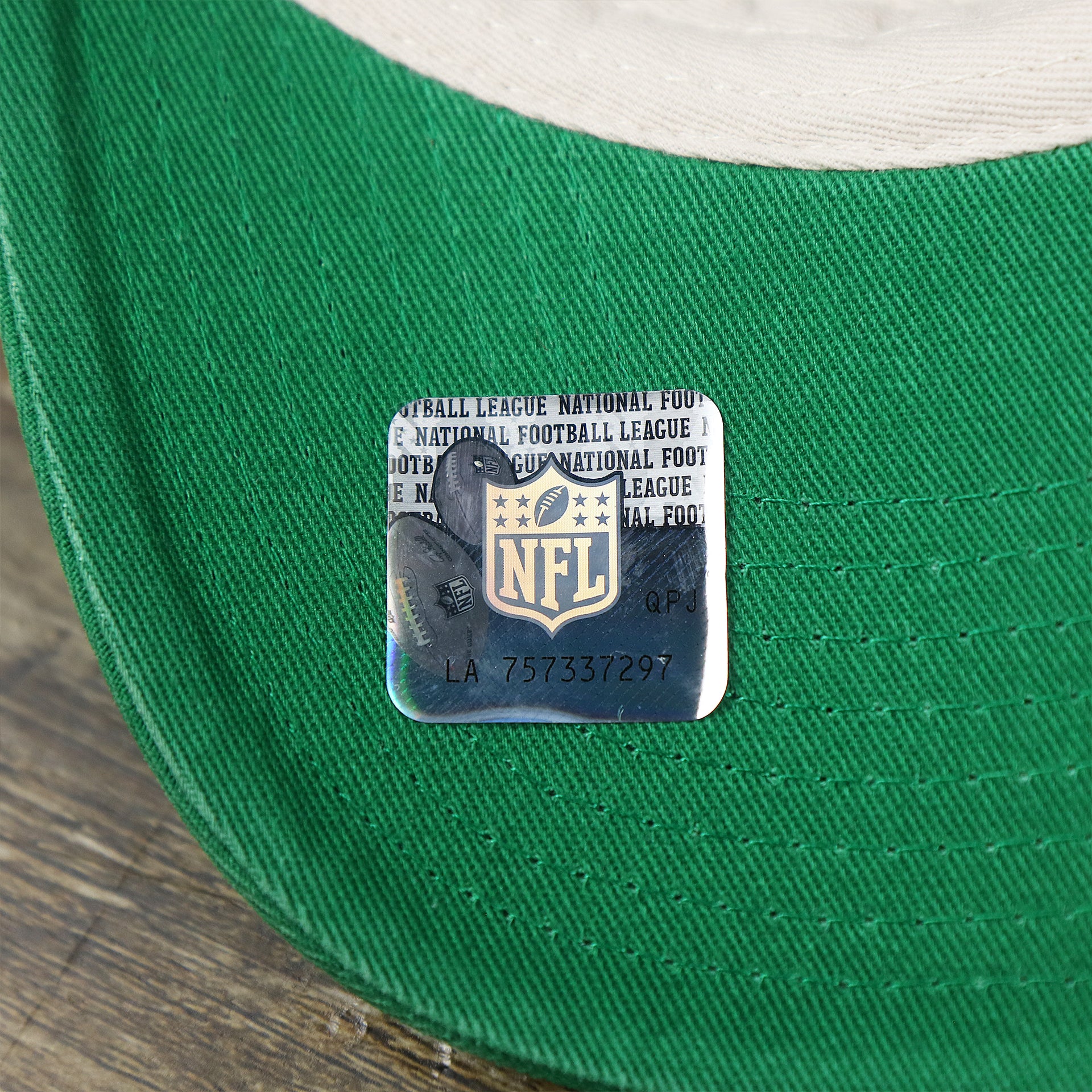 The NFL Sticker on the Throwback New York Jets Embroidered 1963 Jets Logo NFL Jets Side Patch Dad Hat | Bone Dad Hat