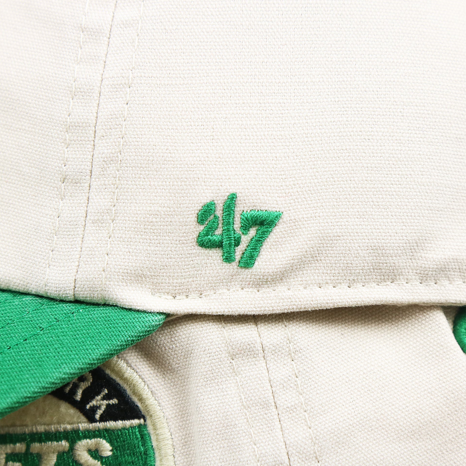 The 47 Brand Logo on the Throwback New York Jets Embroidered 1963 Jets Logo NFL Jets Side Patch Dad Hat | Bone Dad Hat