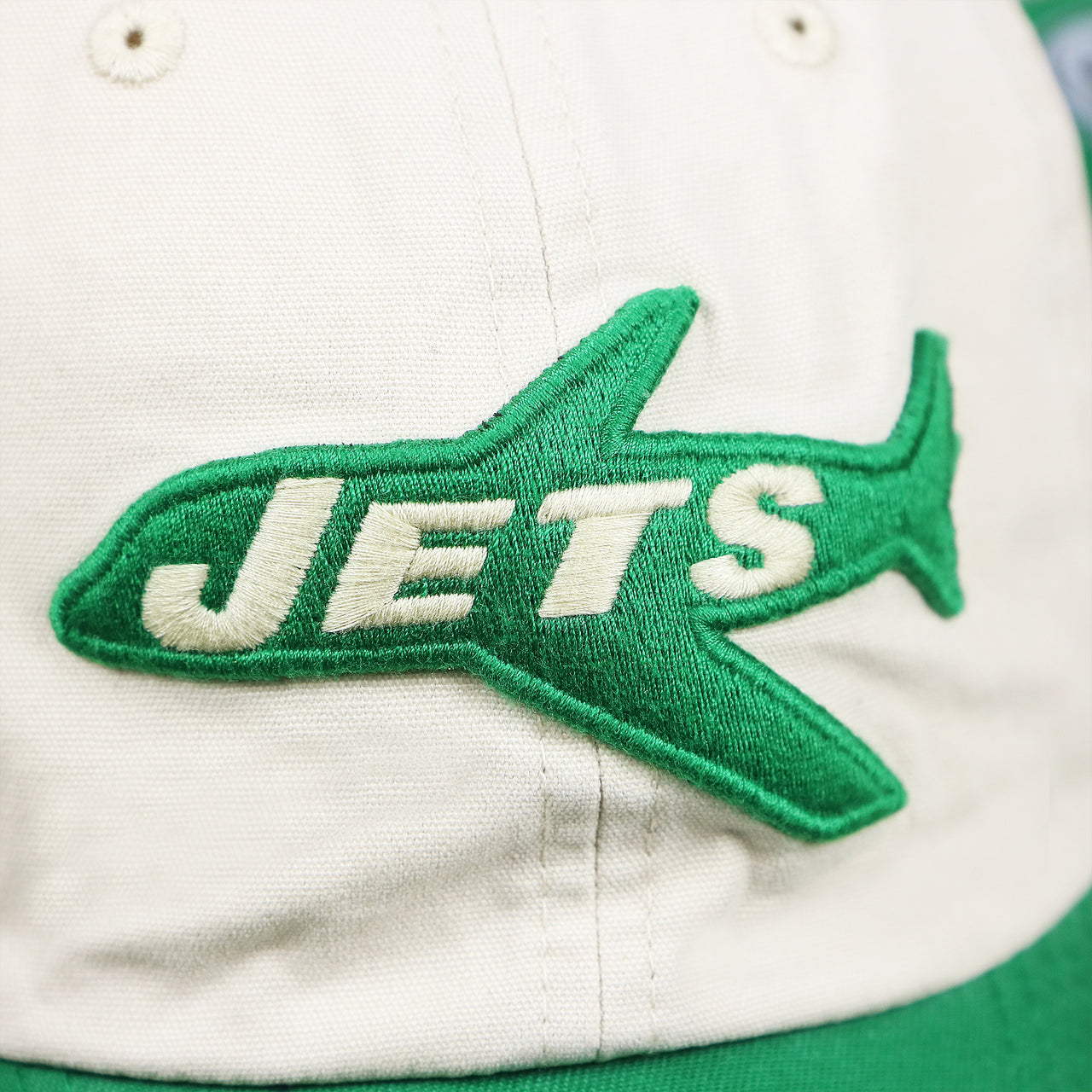 The Jets Logo on the Throwback New York Jets Embroidered 1963 Jets Logo NFL Jets Side Patch Dad Hat | Bone Dad Hat