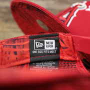 The New Era Tag on the Anaheim Angels Metallic All Star Game MLB 2022 Side Patch 9Fifty Mesh Snapback | ASG 2022 Red Trucker Hat