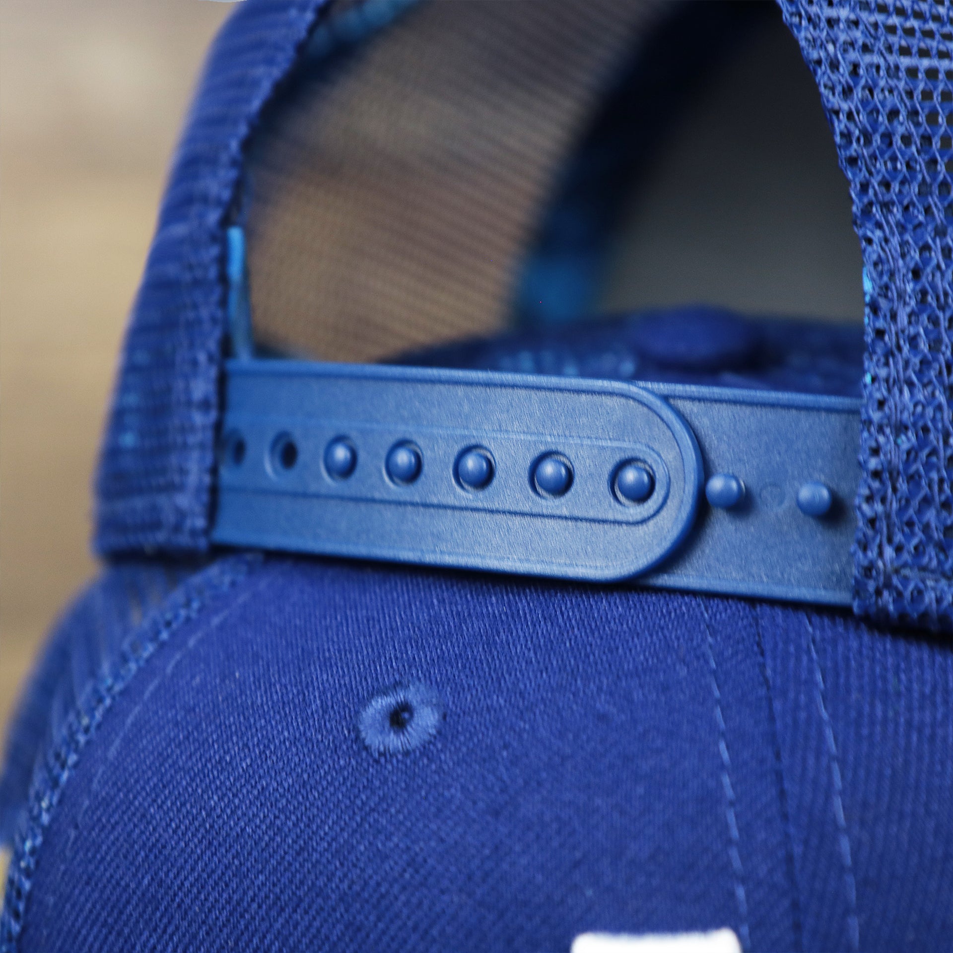 The Blue Adjustable Strap on the Los Angeles Dodgers Metallic All Star Game MLB 2022 Side Patch 9Fifty Mesh Snapback | ASG 2022 Royal Blue Trucker Hat