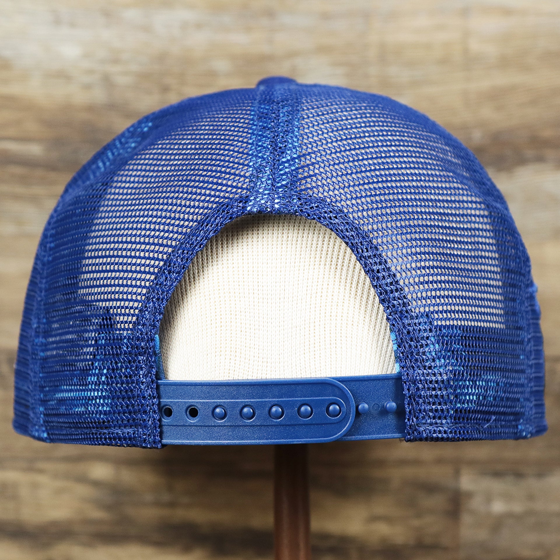The backside of the Youth Los Angeles Dodgers MLB 2022 All Star Game Mesh Back 9Fifty Snapback Cap | ASG 2022 Royal Blue Trucker Hat