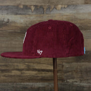 The wearer's left on the Corduroy Philadelphia Phillies Cooperstown Snapback | 47 Brand Dark Maroon