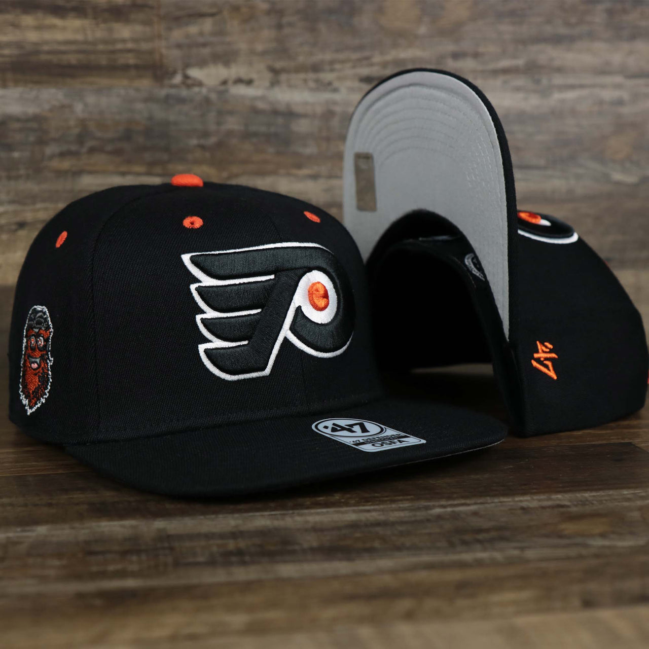 The Philadelphia Flyers Side Patch Dugout Side Defender Fitted Cap | Black Stretch Fitted Cap
