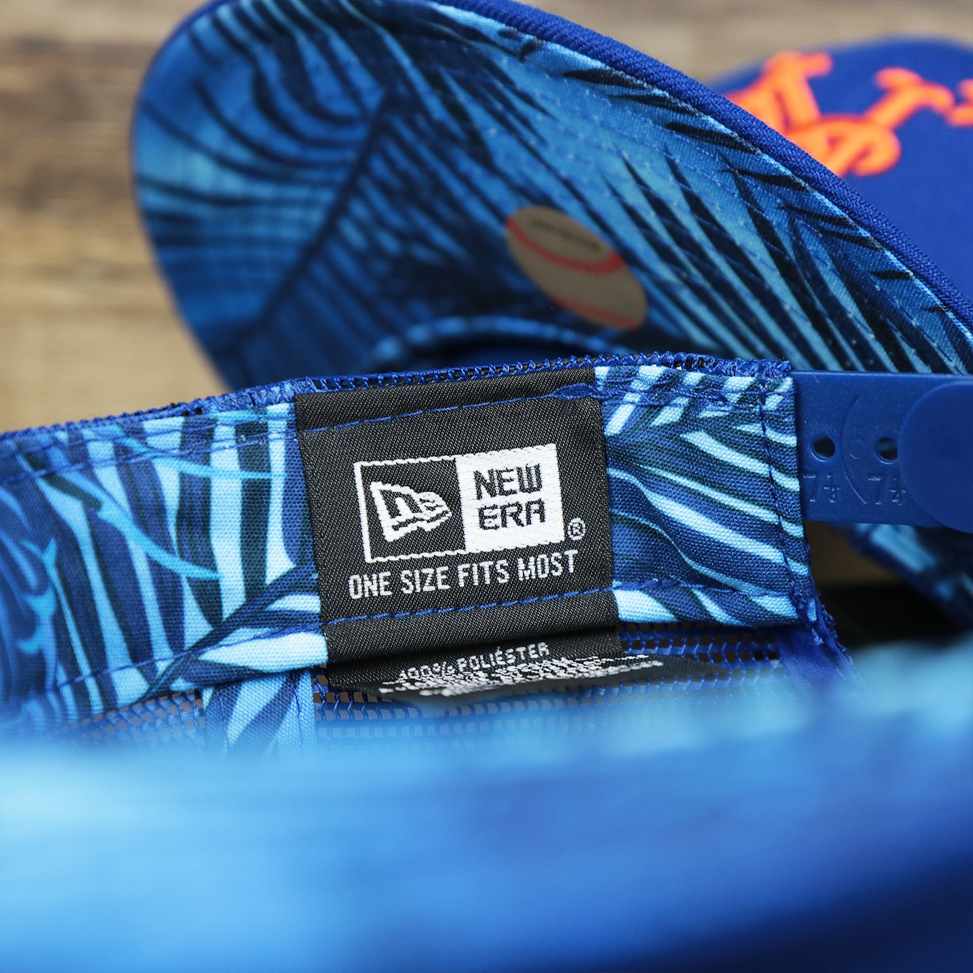 The New Era Tag on the New York Mets Metallic All Star Game MLB 2022 Side Patch 9Fifty Mesh Snapback | ASG 2022 Royal Blue Trucker Hat