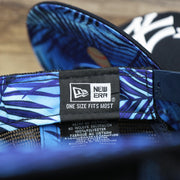 The New Era Tag on the New York Yankees Metallic All Star Game MLB 2022 Side Patch 9Fifty Mesh Snapback | ASG 2022 Navy Blue Trucker Hat