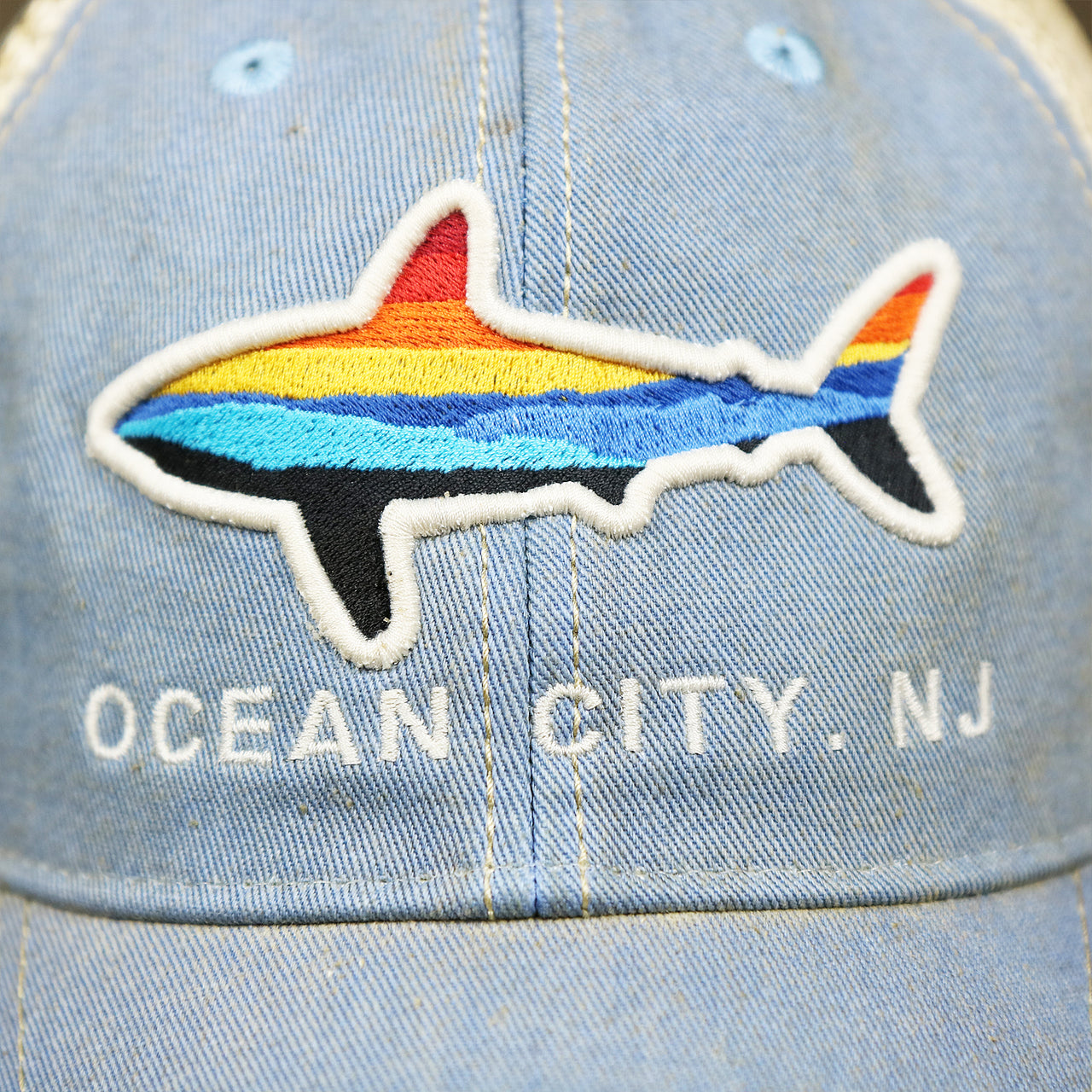The Shark on the Ocean City Horizon Shark Vintage Mesh Back Worn Colorway Trucker Hat | Light Blue Trucker Hat