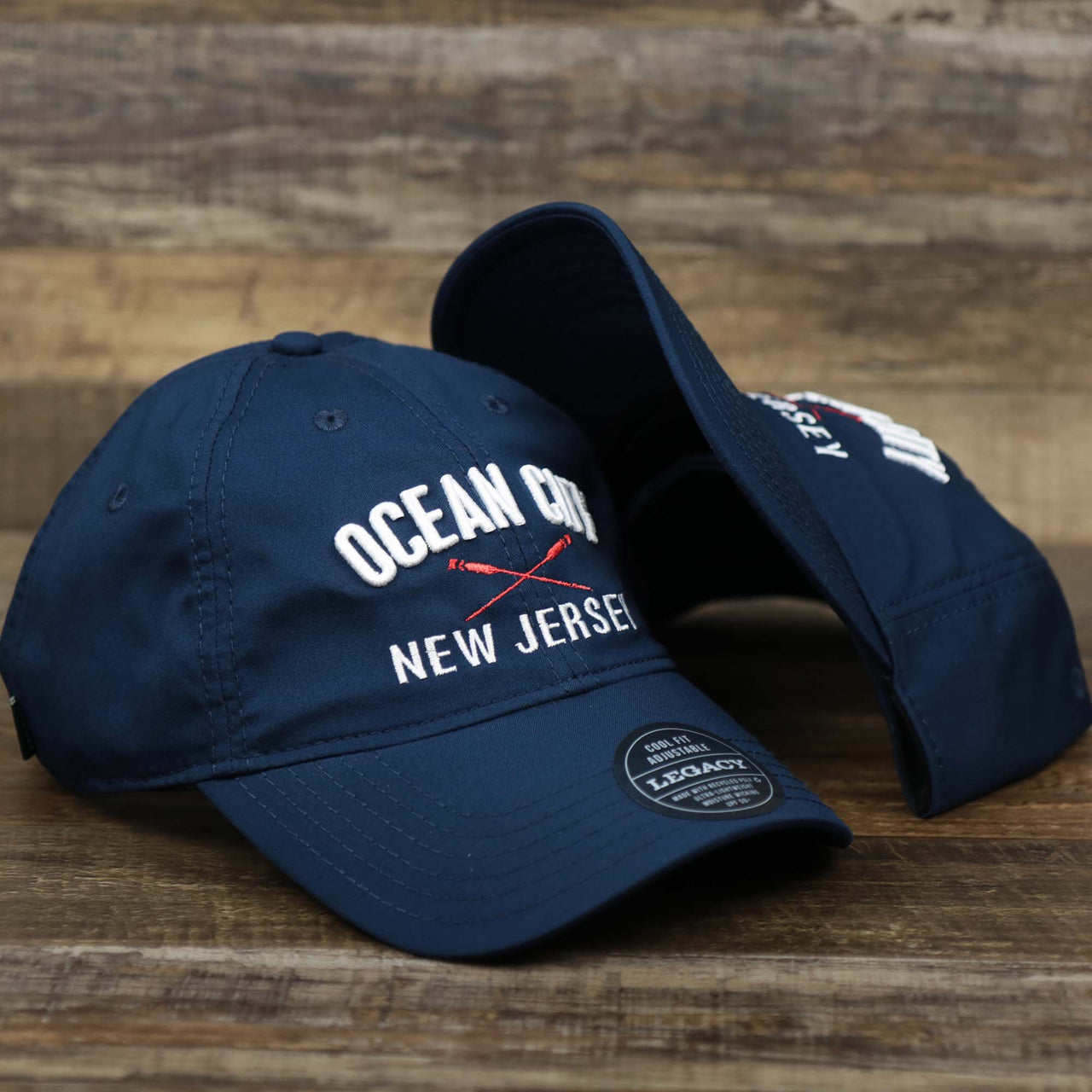 The Ocean City New Jersey Wordmark Crossed Oars Logo Dad Hat | Navy Blue Dad Hat