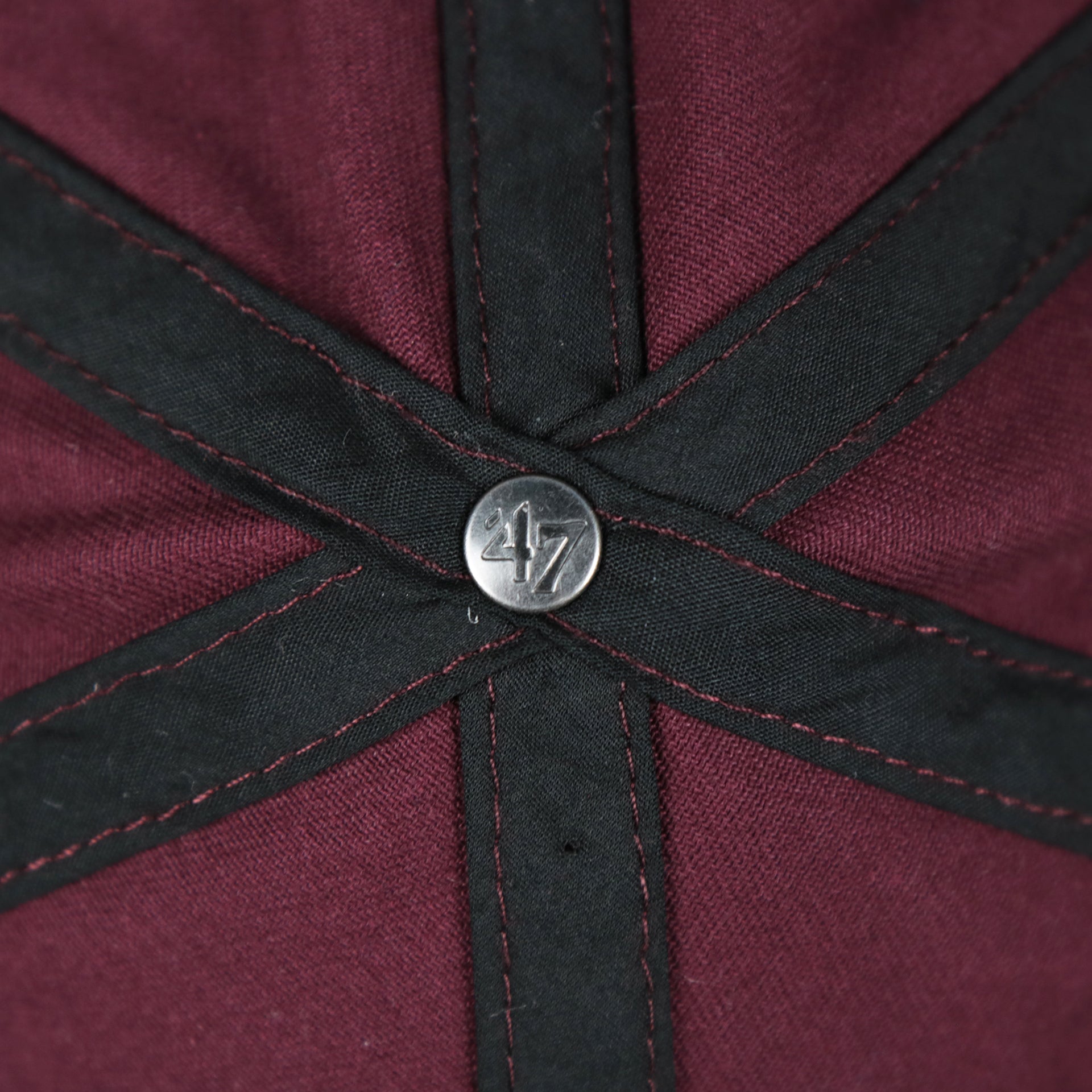 The 47 Brand Engraved Metallic Button on the Cooperstown Philadelphia Phillies Vintage 1910s Phillies Logo Dad Hat | Dark Maroon Dad Hat