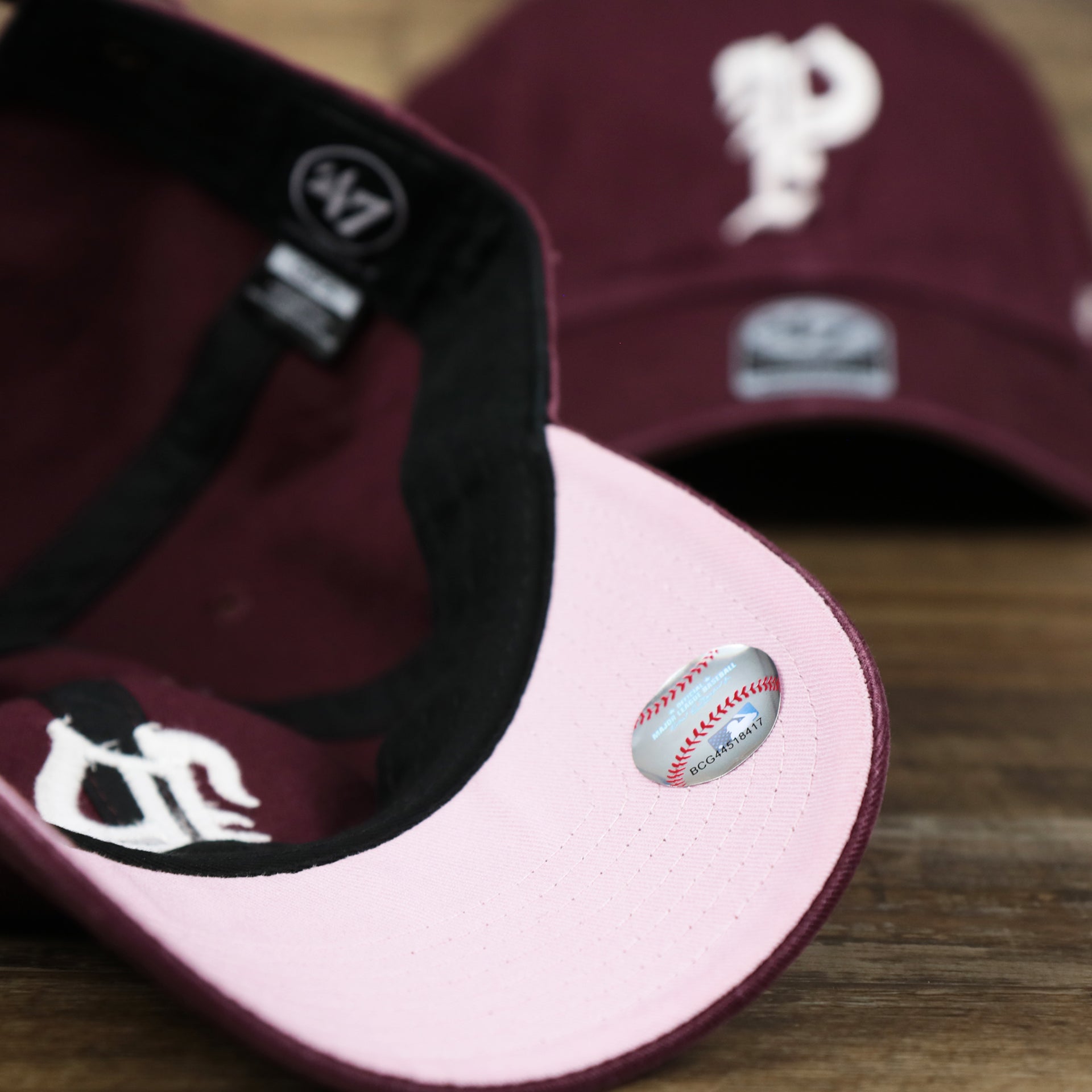 The Pink Undervisor on the Cooperstown Philadelphia Phillies Vintage 1910s Phillies Logo Dad Hat | Dark Maroon Dad Hat