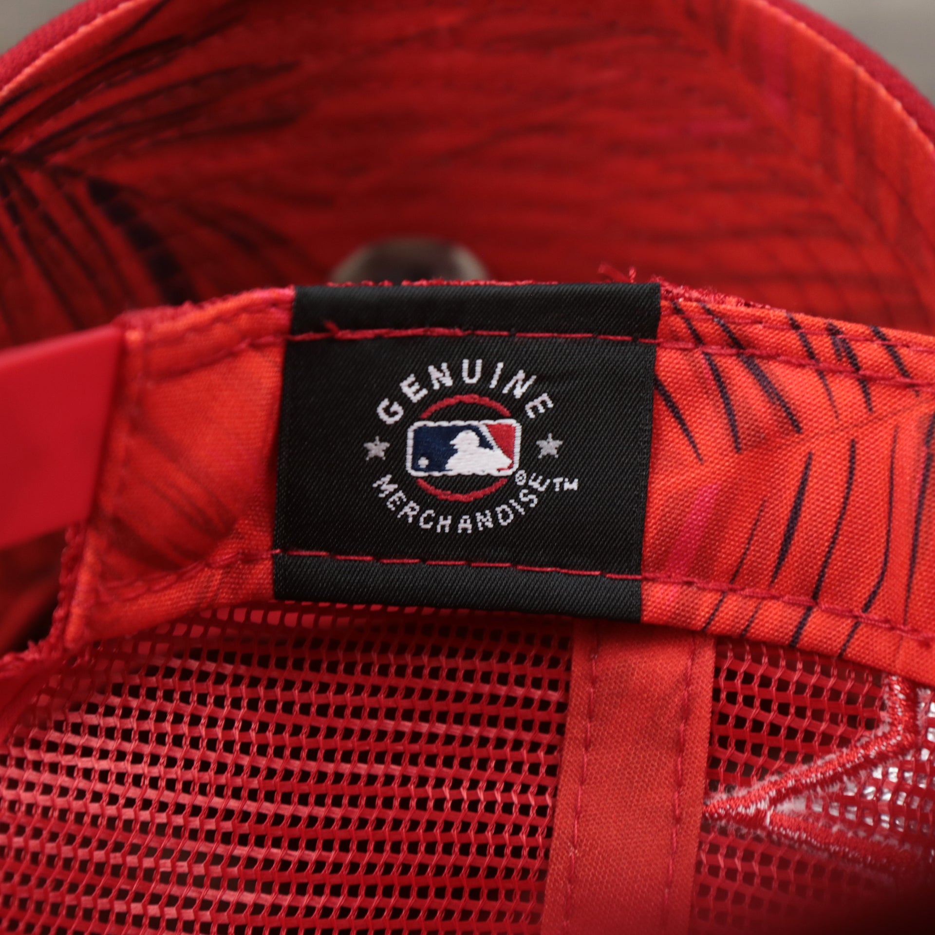The MLB Merchandise on the Philadelphia Phillies Metallic All Star Game MLB 2022 Side Patch 9Forty Mesh Trucker | ASG 2022 Red Trucker Hat