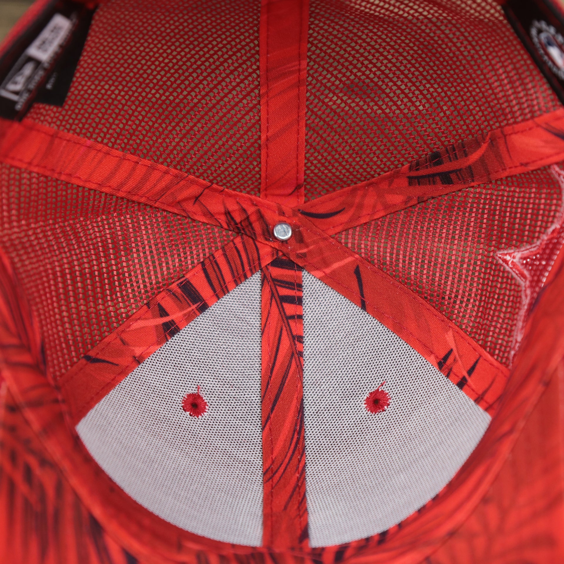The inside of the Philadelphia Phillies Metallic All Star Game MLB 2022 Side Patch 9Forty Mesh Trucker | ASG 2022 Red Trucker Hat