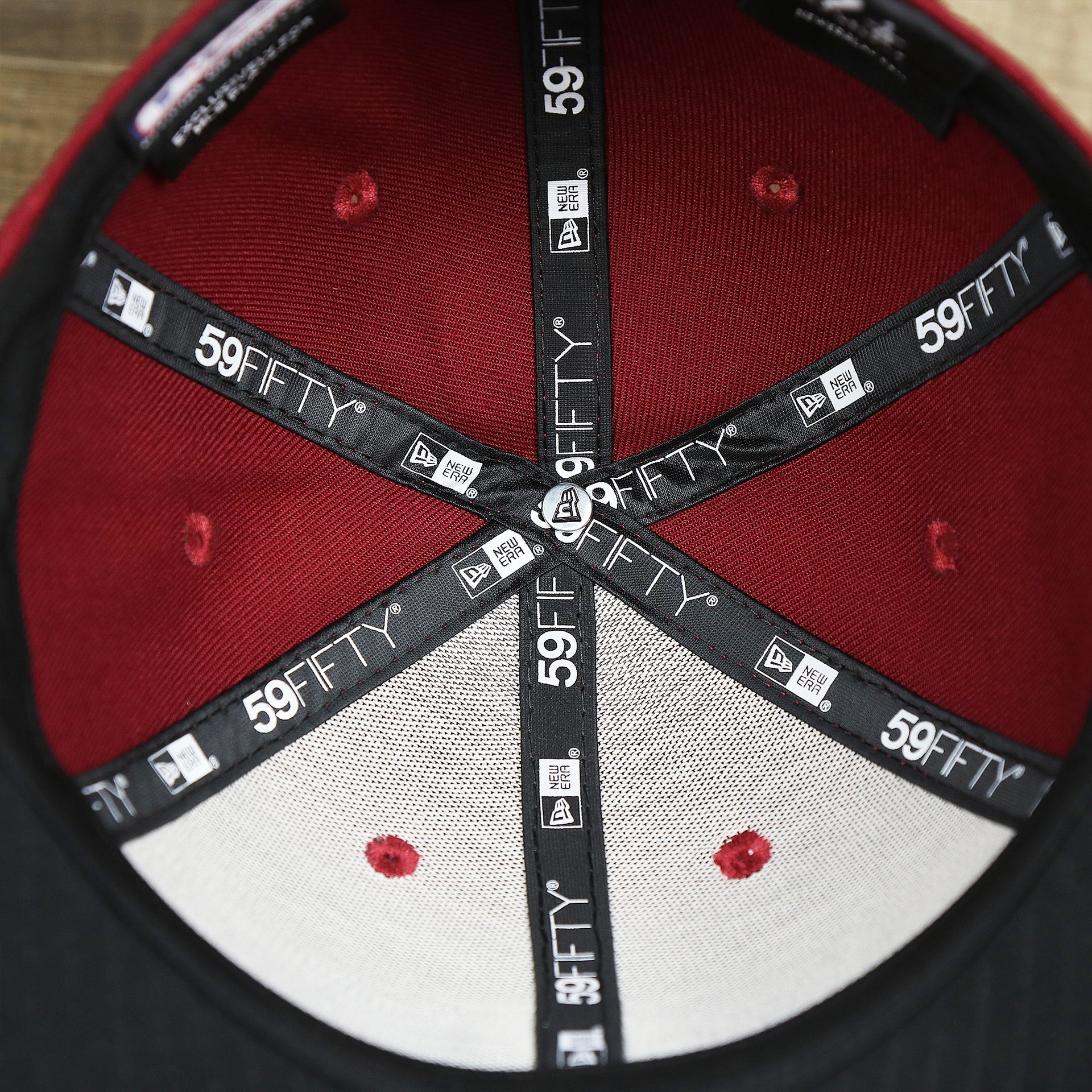 new era taping on the Philadelphia Phillies 2019 Logo Black Bottom | Maroon 59Fifty Fitted Cap