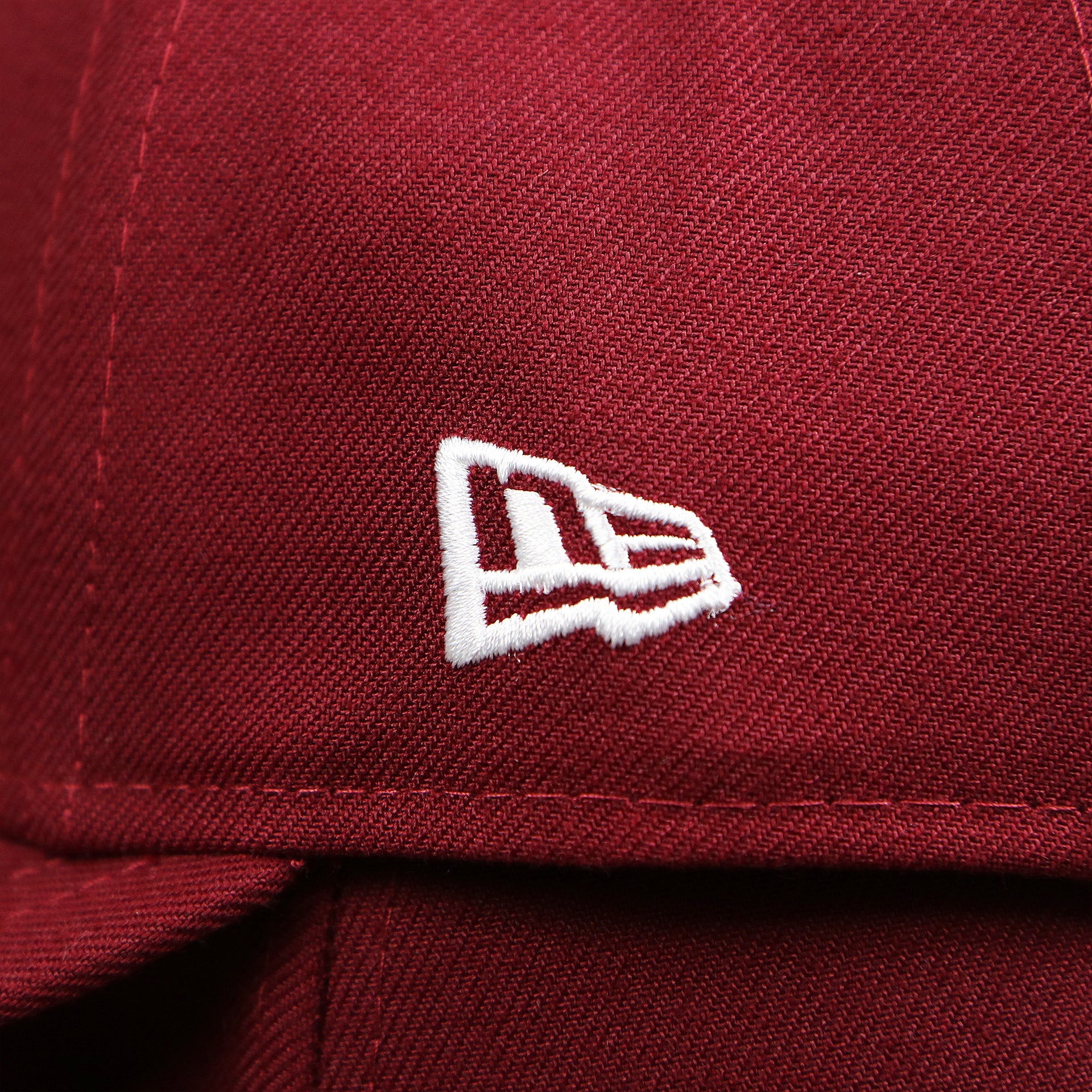 new era logo on the Philadelphia Phillies 2019 Logo Black Bottom | Maroon 59Fifty Fitted Cap