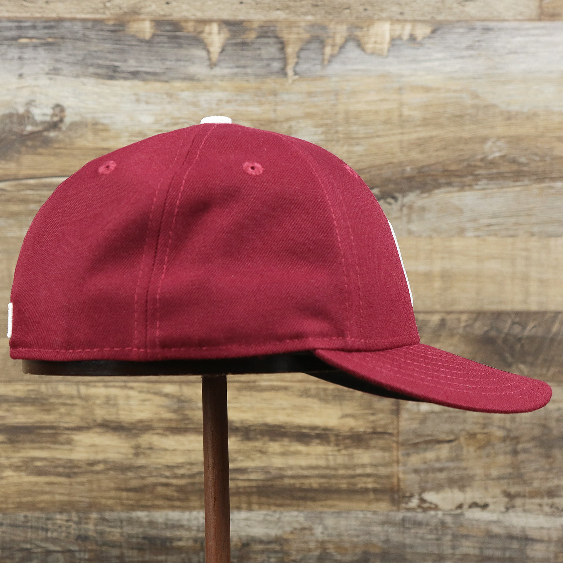 wearer's right of the Philadelphia Phillies 2019 Logo Black Bottom | Maroon 59Fifty Fitted Cap