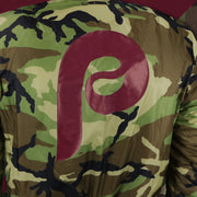 The backside of the Cooperstown Philadelphia Phillies MLB Patch Alpha Industries Reversible Bomber Jacket With Camo Liner | Black Bomber Jacket