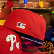 Cooperstown Batterman Logo on the Philadelphia Phillies 2008 World Series Pink Heart Patch 59fifty Pink Brim Fitted Hat | Red