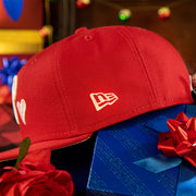 new era logo on the Philadelphia Phillies 2008 World Series Pink Heart Patch 59fifty Pink Brim Fitted Hat | Red