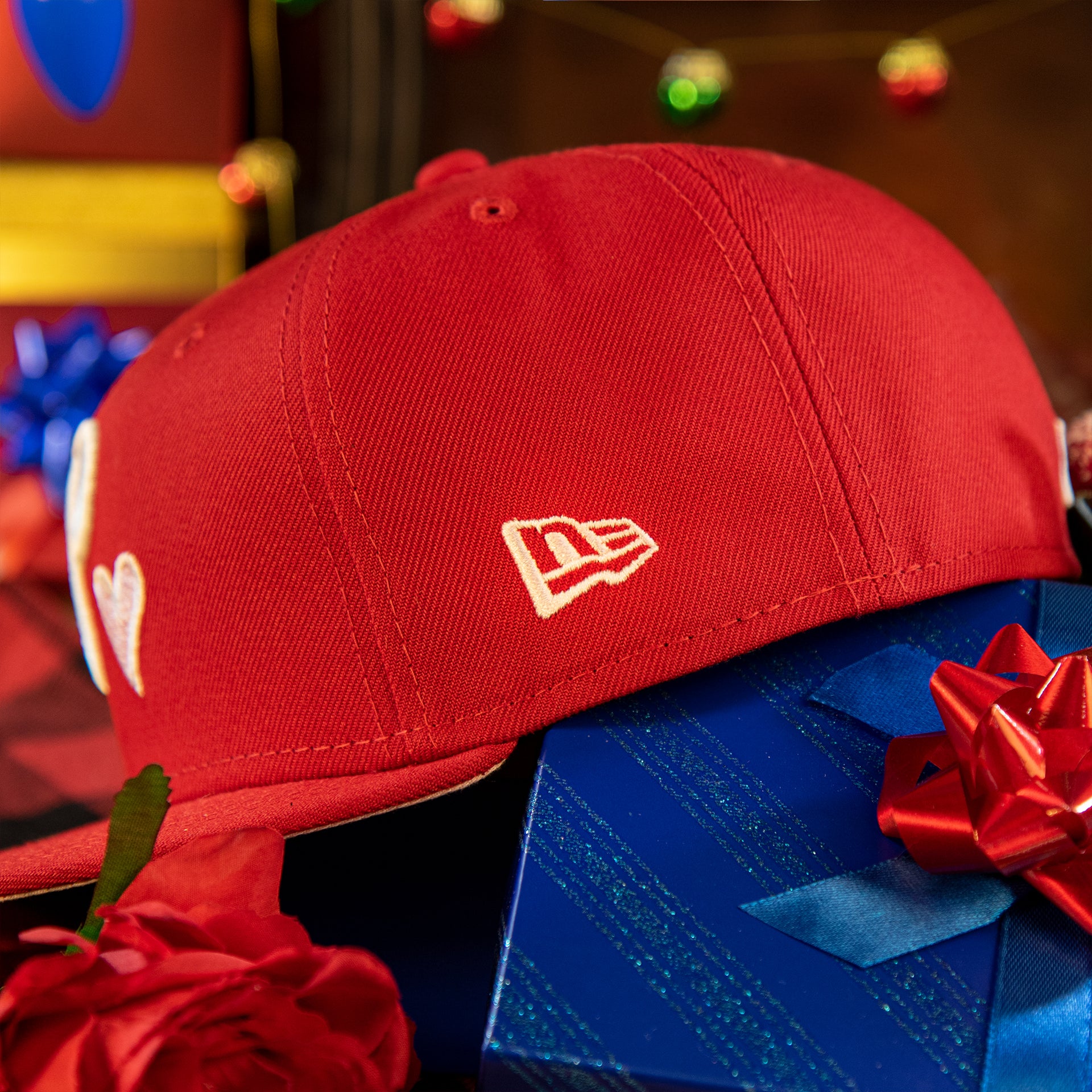 new era logo on the Philadelphia Phillies 2008 World Series Pink Heart Patch 59fifty Pink Brim Fitted Hat | Red