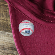 The MBL Baseball Sticker on the Cooperstown Philadelphia Phillies White Cooperstown Logo Dad Hat | Cardinal Dad Hat