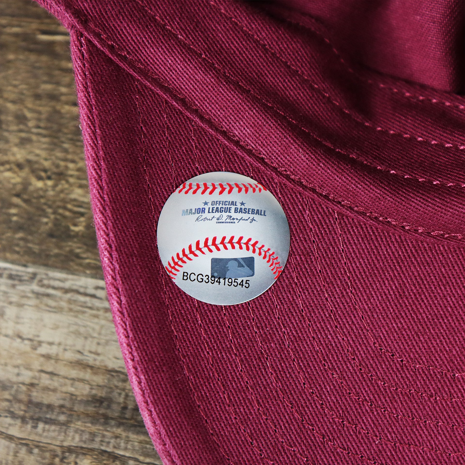 The MBL Baseball Sticker on the Cooperstown Philadelphia Phillies White Cooperstown Logo Dad Hat | Cardinal Dad Hat