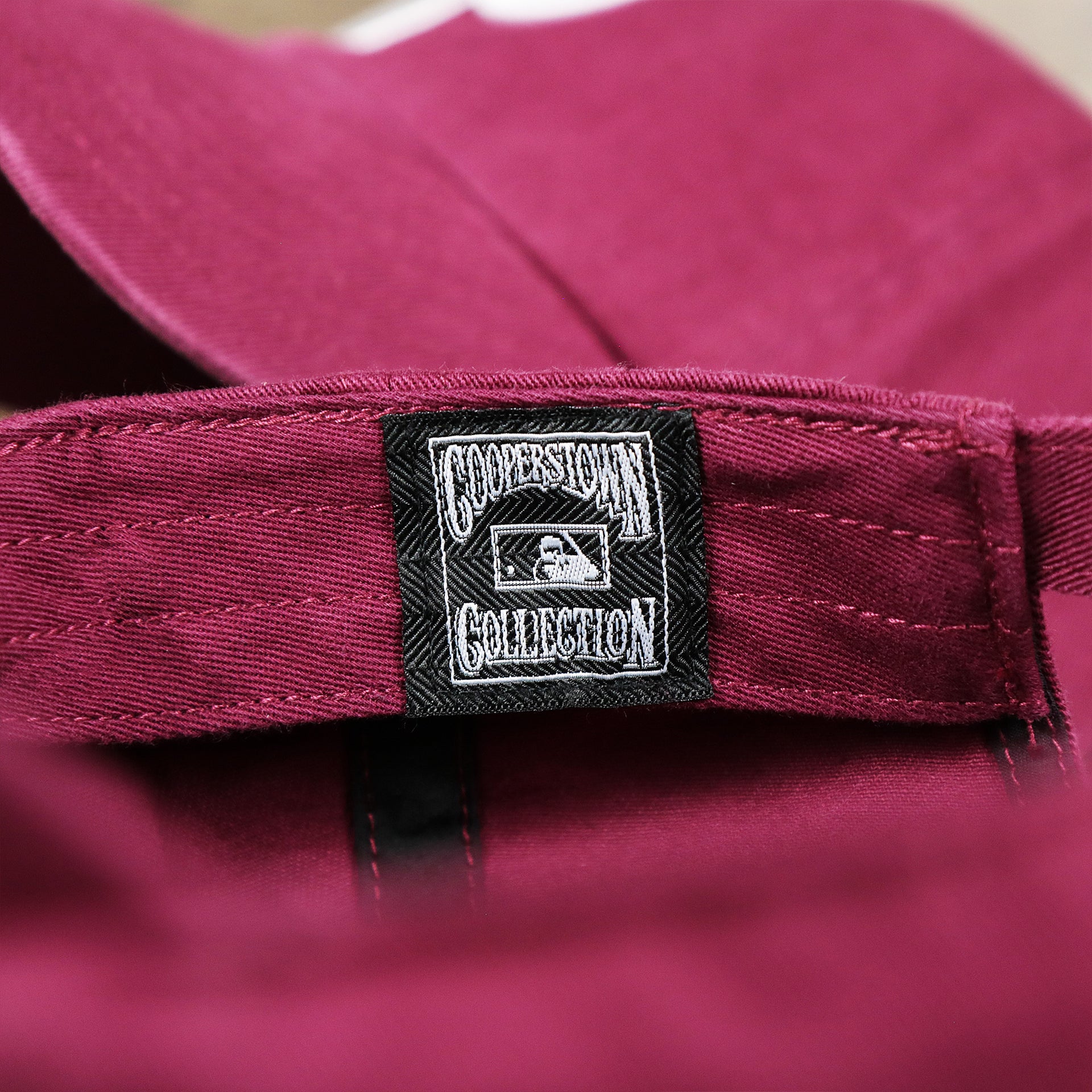 The Cooperstown Collection Tag on the Cooperstown Philadelphia Phillies White Cooperstown Logo Dad Hat | Cardinal Dad Hat