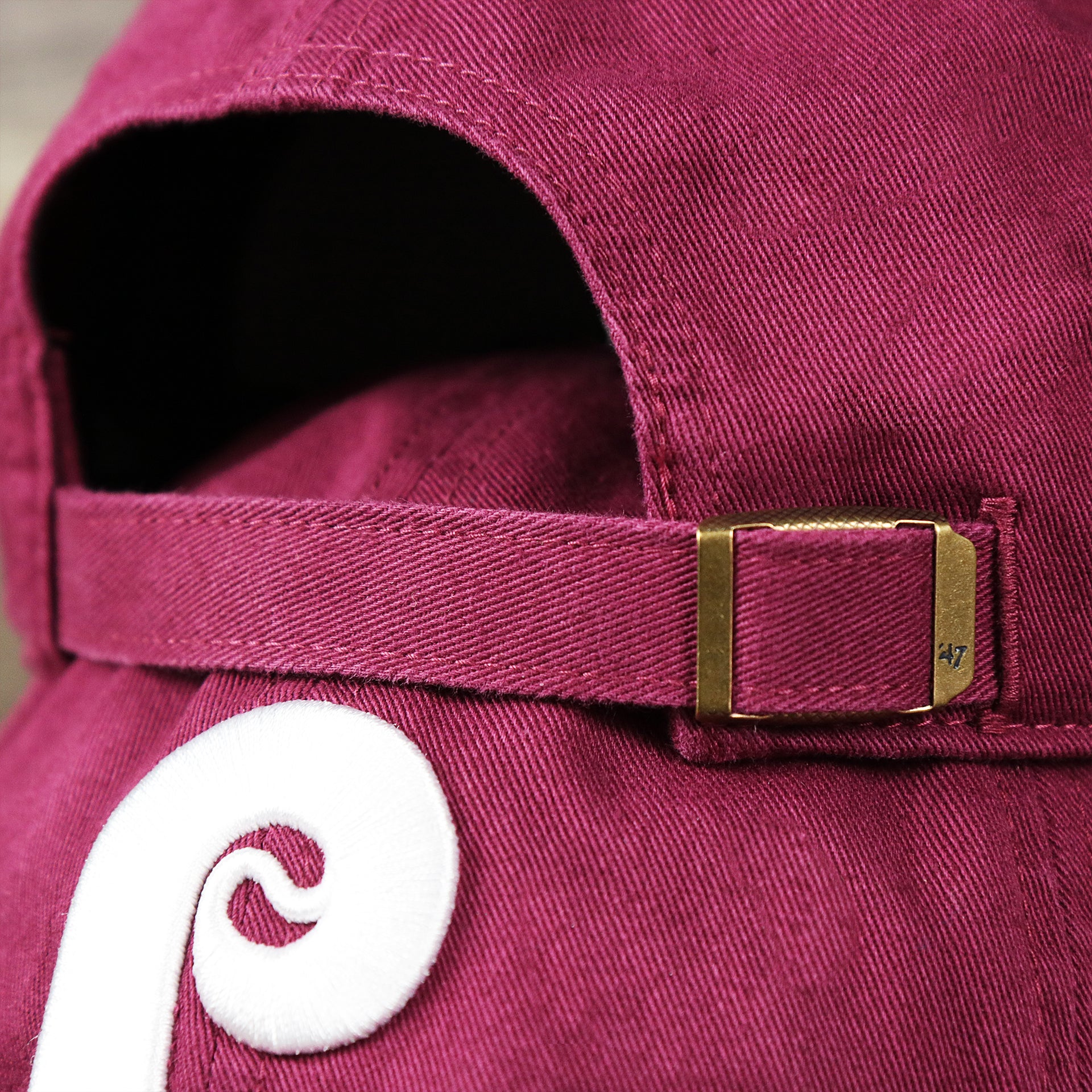 The backside of the Cooperstown Philadelphia Phillies White Cooperstown Logo Dad Hat | Cardinal Dad Hat