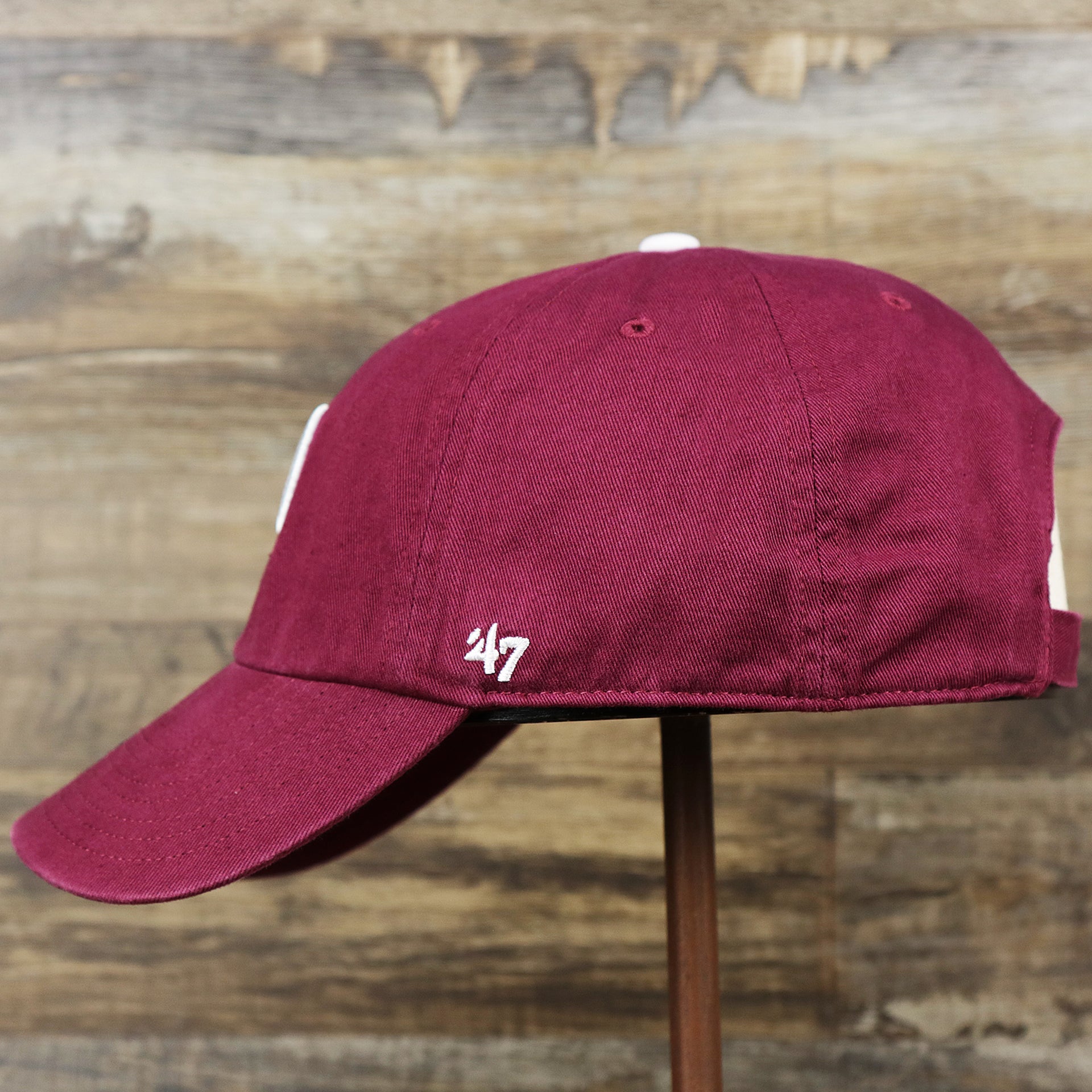 The wearer's left on the Cooperstown Philadelphia Phillies White Cooperstown Logo Dad Hat | Cardinal Dad Hat