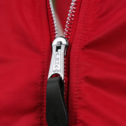 The Alpha Engraved Zipper on the Philadelphia Phillies MLB Patch Alpha Industries Reversible Bomber Jacket With Camo Liner | Red Bomber Jacket