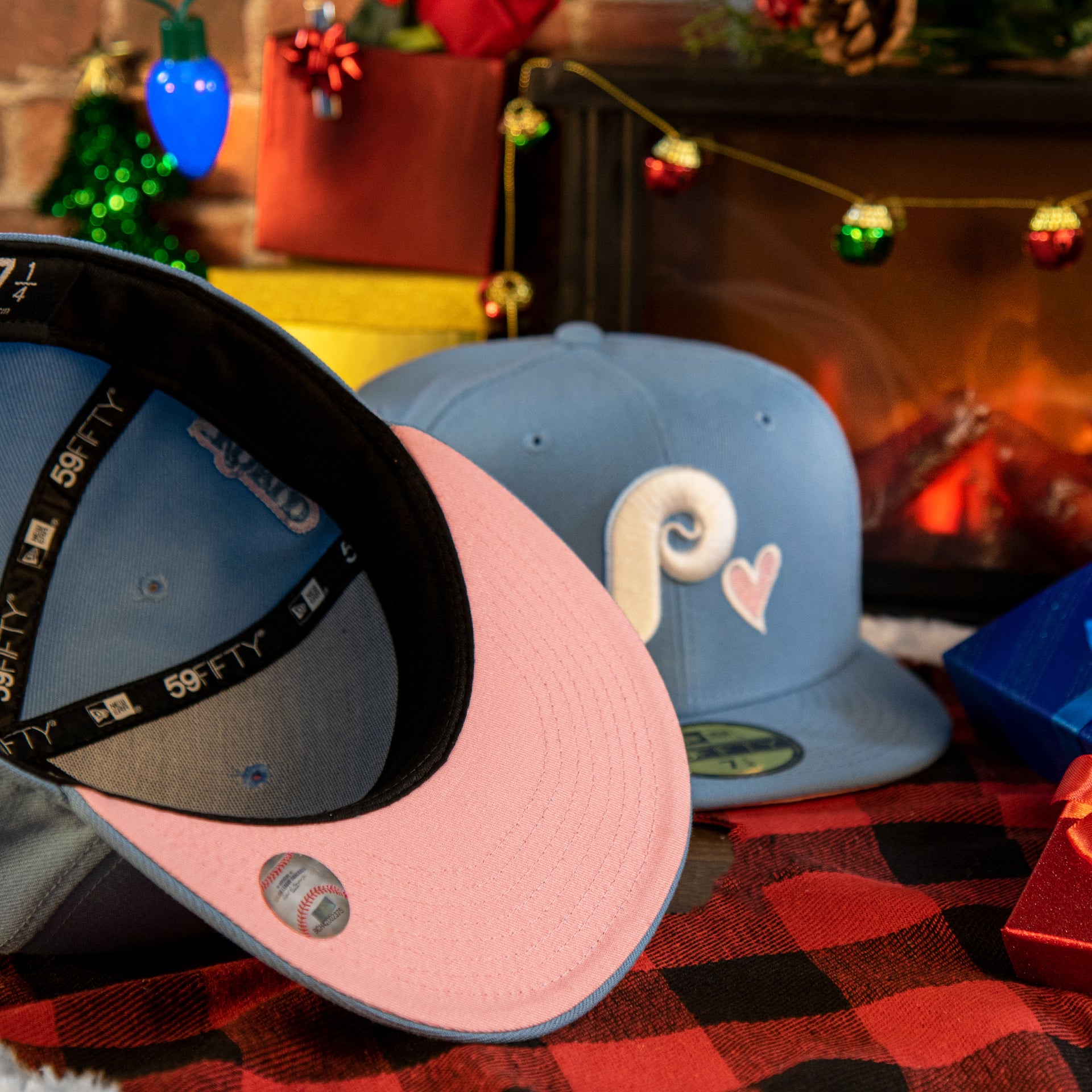 pink under visor on the Philadelphia Phillies Heart Patch 1980 World Series Pink Bottom Brim Icy Blue Fitted Cap | Phillies Side Patch 59Fifty Fitted Cap