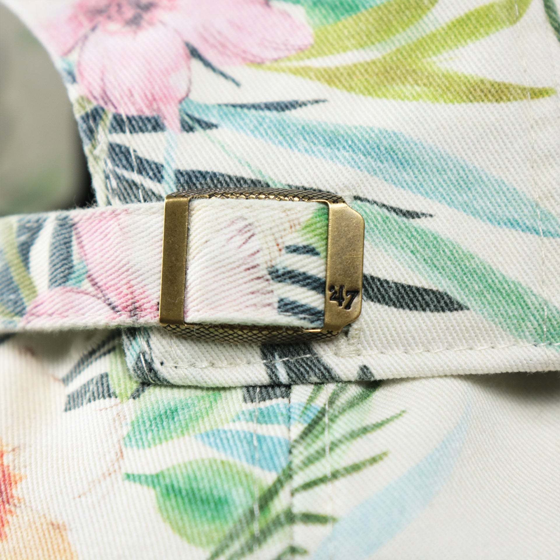 The 47 Brand Metallic Buckle on the Women’s Philadelphia Phillies Floral Print Gray Bottom Dad Hat | White Dad Hat