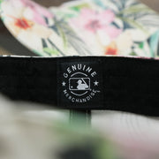 The MLB Merchandise tag on the Women’s Philadelphia Phillies Floral Print Gray Bottom Dad Hat | White Dad Hat