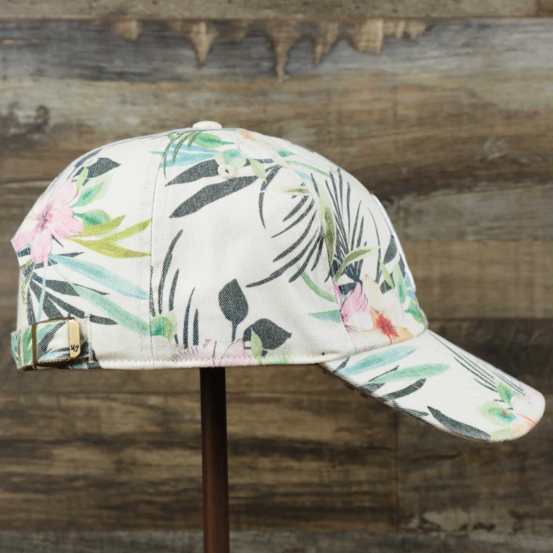 The wearer's right on the Women’s Philadelphia Phillies Floral Print Gray Bottom Dad Hat | White Dad Hat