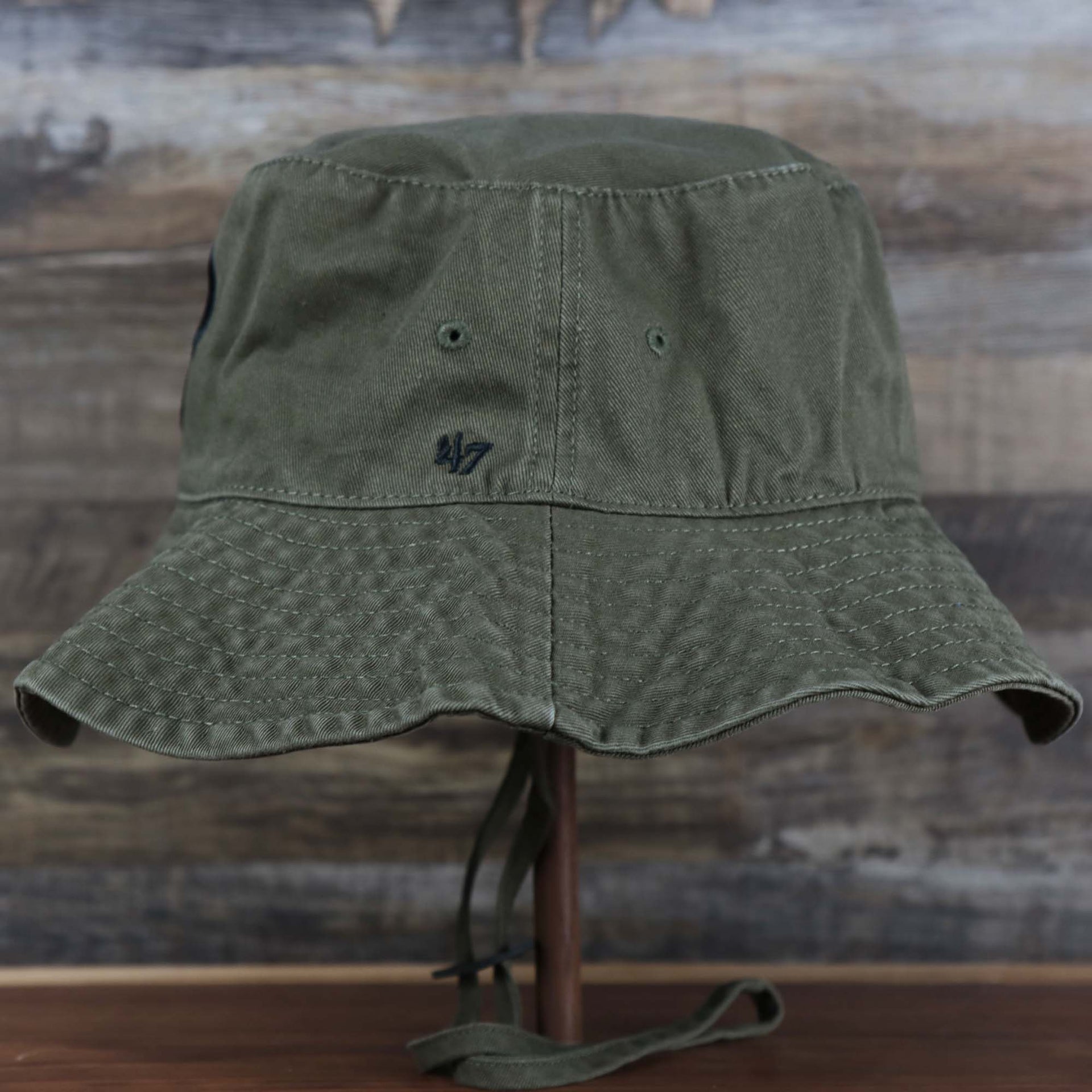 The wearer's left on the Philadelphia Phillies Bucket Hat | 47 Brand, Sandalwood