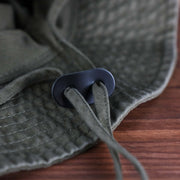 The chin strap on the Philadelphia Phillies Bucket Hat | 47 Brand, Sandalwood