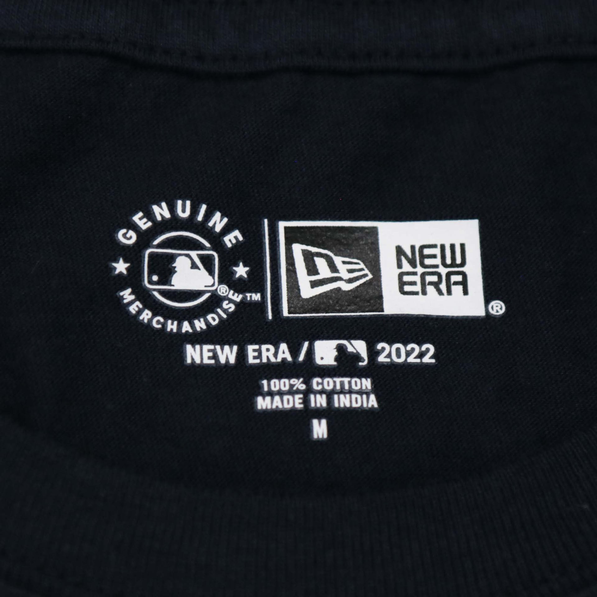 The New Era Tag on the Philadelphia Phillies 2022 4th of July Stars and Stripes T-Shirt | New Era Navy