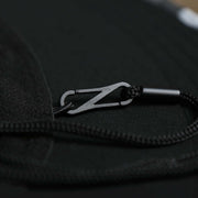 The adjustable chin strap on the