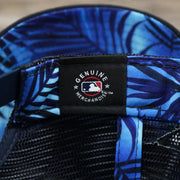 The MLB Merchandise Tag on the Boston Red Sox Metallic All Star Game MLB 2022 Side Patch 9Forty Mesh Trucker | ASG 2022 Navy Blue Trucker Hat