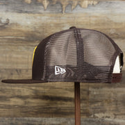 The wearer's left on the San Diego Padres Metallic All Star Game MLB 2022 Side Patch 9Fifty Mesh Snapback | ASG 2022 Brown Trucker Hat