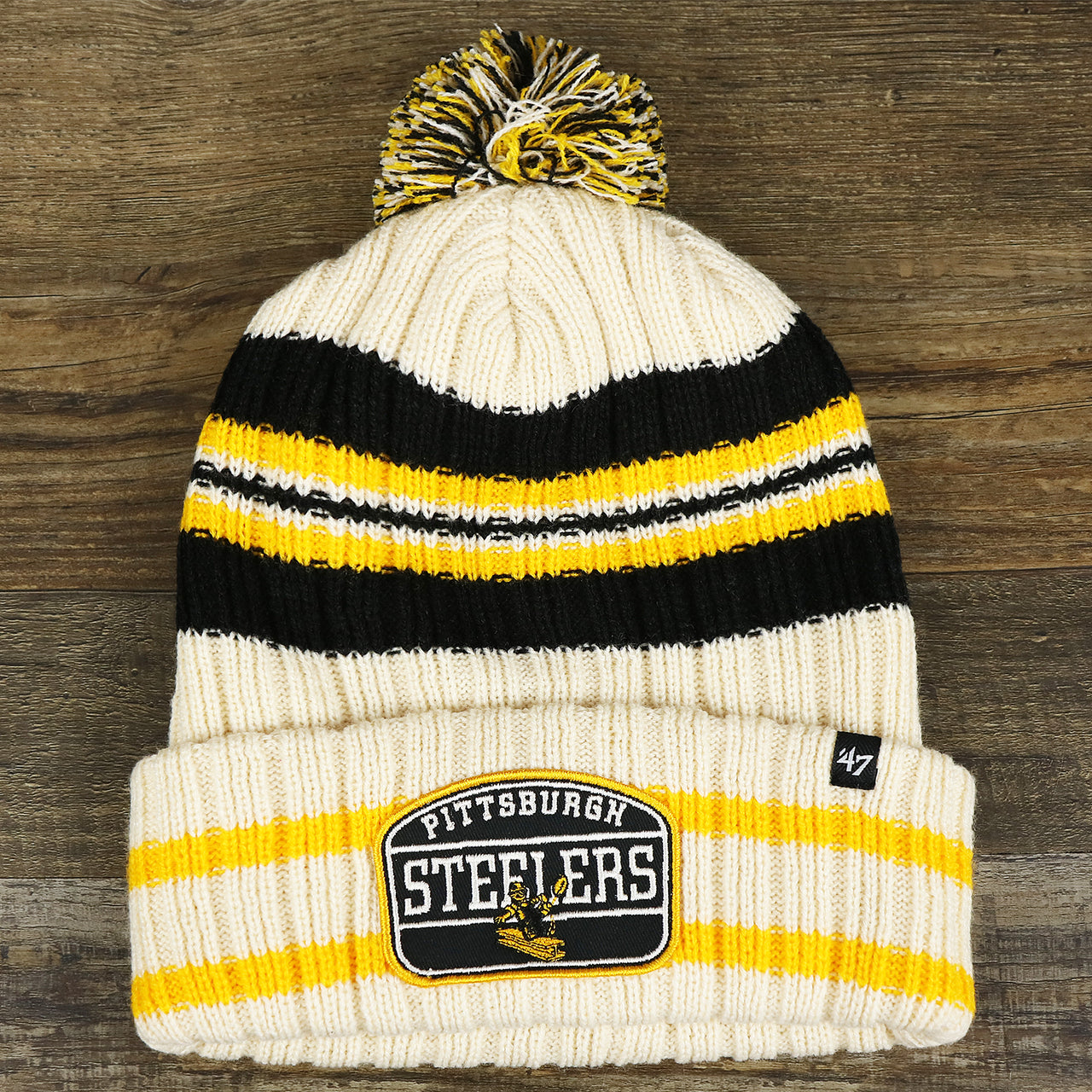 The Throwback Pittsburgh Steelers Legacy 1962 Steelers Patch Pom Pom Beanie | Natural Beanie