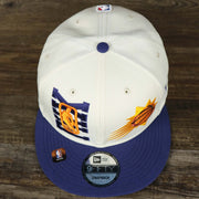 An overhead shot of the Phoenix Suns NBA 2022 Draft Gray Bottom 9Fifty Snapback | New Era Cream/Purple